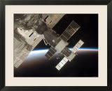 The Docked Soyuz 13 (TMA-9) (Foreground) and Progress 22 Resupply Vehicle
