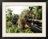 Airmen Hidden in Brush Wearing Their Ghille Suits