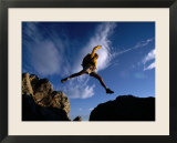 Hiker Jumping Between Rocks in the Wasatch Mountains  Wasatch-Cache National Forest  Utah  USA