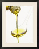 Pouring Olive Oil Over a Spoon