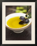 Olive Oil in Small Bowl with Black Olives
