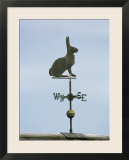 A Rabbit-Shaped Weather Vane Atop a Roof