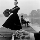 Skater in a Digby Morton Fur Trimmed Velvet Coat and Michael Bentley in the Background  1955