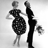 Model Wearing a Puff Ball Skirt and Escort with Roses  1958