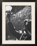 Owner of Vineyard Henri de Villaine Inspecting Wine for Clarity and Hue