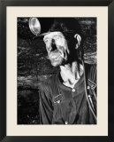 Coal Miner with Head Gear on Working in Mine