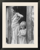 Pregnant Sharecropper's Wife Standing in Doorway of Wooden Shack with Daughter  the Depression