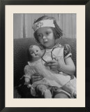 Evelyn Mott playing Nurse with doll as parents adjust children to abnormal conditions in wartime