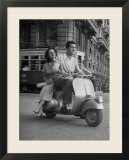 Man and Woman Riding a Vespa Scooter