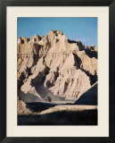 Car Driving Through Rocky Landscape in Badlands National Park