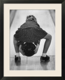 Child Bowling at a Local Bowling Alley