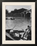 Man Playing Cello on Boat