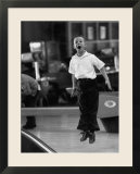 Child Bowling at a Local Bowling Alley