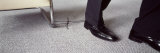 Man's Leg Tied to a Chair with Shoelace