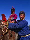 Karakorum  Horse Herder and His Son on Horseback  Mongolia