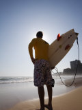 A Surfer Looks Out to the Waves at Manly Beach on Sydney's North Shore  Australia