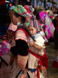 Flower Hmong Woman Carrying Baby on Her Back  Bac Ha Sunday Market  Lao Cai Province  Vietnam