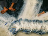 Detail of Feet Being Used to Repair Fishing Nets  Vietnam