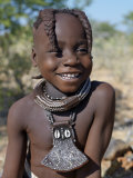 Young Himba Girl  Her Body Lightly Smeared with Mixture of Red Ochre  Butterfat and Herbs  Namibia