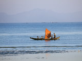 Tthe Crew of Small Fishing Boat Hurries Home to Sittwe Harbour with their Catch  Burma  Myanmar