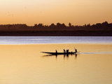 Mopti  at Sunset  a Boatman in a Pirogue Ferries Passengers across the Niger River to Mopti  Mali