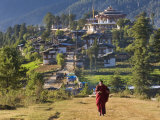Monk Leaving Gangtey Dzong  and Village  Phobjikha Valley  Bhutan