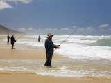 Queensland  Fraser Island  Fishermen Wade into the Surf on Seventy-Five Mile Beach  Australia