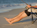 A Man Fishes from His Deck Chair in Platypus Bay on Fraser Island's West Coast  Australia