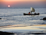 Crew of Fishing Boat Hurries Home to Sittwe as Sun Sets over the Bay of Bengal  Burma  Myanmar
