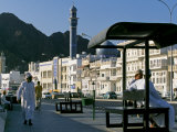 Omanis Walk and Sit Alongside Muttrah's Busy Corniche
