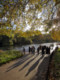 People Enjoy an Autumn Walk in St James's Park in Autumn