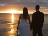 Couple Hand in Hand Watch Sun Set from Beach  Kingfisher Bay  Fraser Island  Queensland  Australia