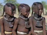 Three Young Girls  their Bodies Lightly Smeared with Red Ochre Mixture  Namibia