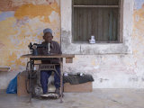 Man Works His Sewing Machine on Ibo Island  Part of the Quirimbas Archipelago  Mozambique