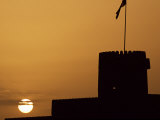 Silhouette of One of the Towers of Ras Al Hadd Castle at Sunset  Oman