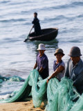 Carrying Fishing Nets Up the Beach after the Day's Work