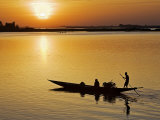 Mopti  at Sunset  a Boatman in a Pirogue Ferries Passengers across the Niger River to Mopti  Mali