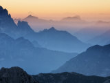 View over Mountaintops at Dusk from Mangrt Pass Looking from Slovenia Towards Italy at Sunset