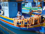 Fisherman Knotting a Fishing Net  Marsaxlokk  Malta  Mediterranean  Europe