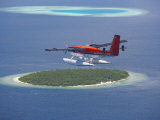 Maldivian Air Taxi Flying Above Island  Maldives  Indian Ocean  Asia
