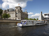Tour Boat on River Cruise on the Spree River Passing the Reichstag  Berlin  Germany