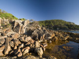 Mimosa Rocks and Rock Pool in Natural Bay Composed of Volcanic Rhyolite Rock