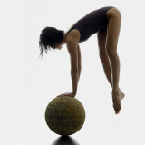 Woman Balancing on Globe