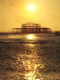 Sun over Ruin of West Pier  Brighton  Sussex  England
