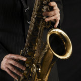 Male Hands Playing Saxophone