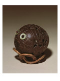 Coconut Sculpted into a Face  c1895