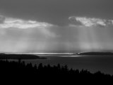 Rays of Light Shine Through the Clouds on Pender Island  British Columbia  Canada