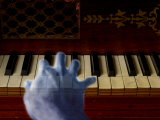 Ghost Hand Playing the Piano