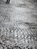 Person's Feet Walking Down Cobblestone Street in Rome  Italy
