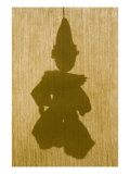 Silhouette of a Sock Puppet Behind a Screen